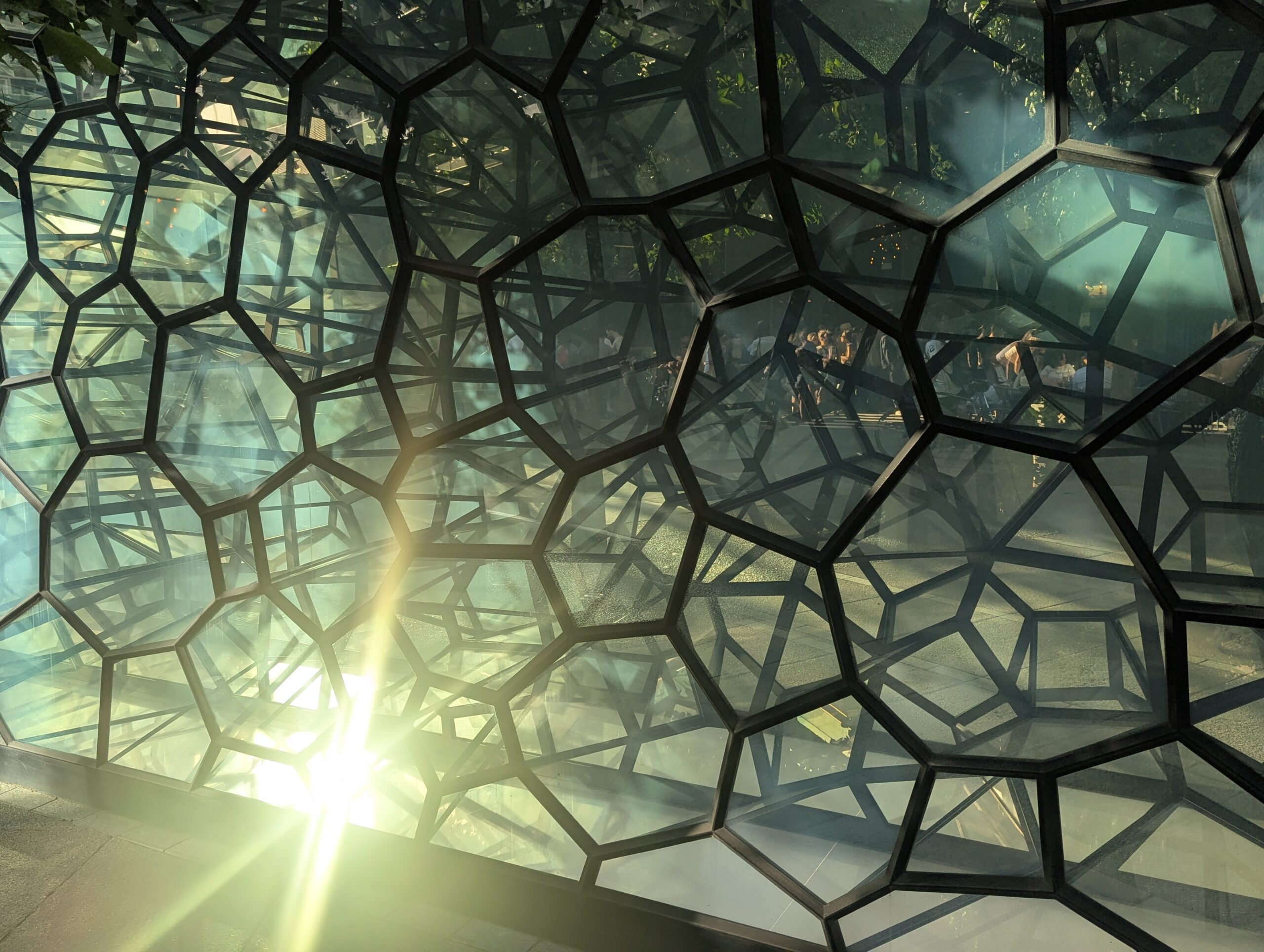 Geometric glass roof made from many repeating polygonal sections